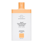 Drunk Elephant Kamili Cream Body Cleanser bottle closeup highlights gentle cleansing for sensitive skin