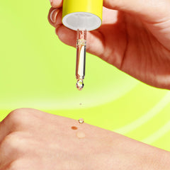 Drunk Elephant Virgin Marula Oil on the hand highlights easy, precise application and hydration.