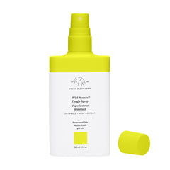 Drunk Elephant Wild Marula Tangle Spray mist-on application shown for quick detangling during styling.