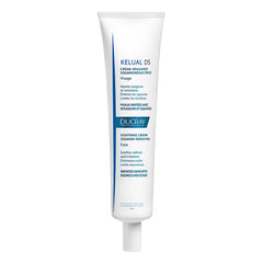 Ducray Kelual DS soothing cream tube close-up, highlighting lightweight texture for irritated skin relief.