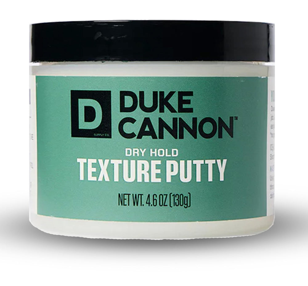 Duke Cannon Dry Hold Putty packaging illustrating no-shine finish.