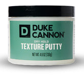 Duke Cannon Dry Hold Putty packaging illustrating no-shine finish.