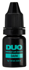 DUO Individual Lash Adhesive Dark applying demonstrates secure placement during precise lash application.