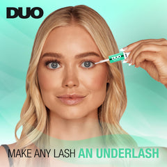 DUO Under Lash Glue & Seal mini-spoolie applicator demonstrates mascara-like precision.