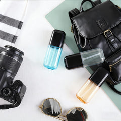 Dymoece travel spray bottle set closed, ideal for safe packing in luggage.