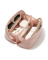 EACHY Travel Makeup Bag opened flat for quick access to cosmetics on the go.
