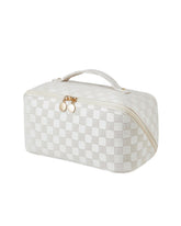 EACHY Travel Makeup Bag shows spacious design for organized cosmetics on trips.