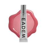 EADEM Le Chouchou Guava Fresca tube close showing clear, glossy lip hydration.