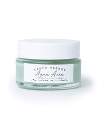 Earth Harbor AQUA AURA Eye Creme jar closeup demonstrates lightweight hydration for the eye area.