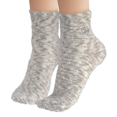 Earth Therapeutics Aloe Socks vitamin-e-infusion close-up emphasizes nourished feet.