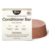 The Earthling Co. conditioner bar bottle pour for easy detangling and conditioning.