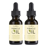 Earthly Body Miracle Oil bottle pour demonstrates versatile hydration for dry skin.