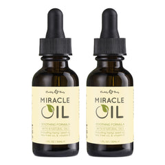 Earthly Body Miracle Oil bottle pour demonstrates versatile hydration for dry skin.