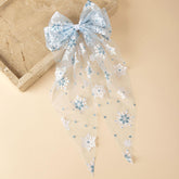 Ecuupas lace snowflake bow clip in blue and white closeup for winter outfits