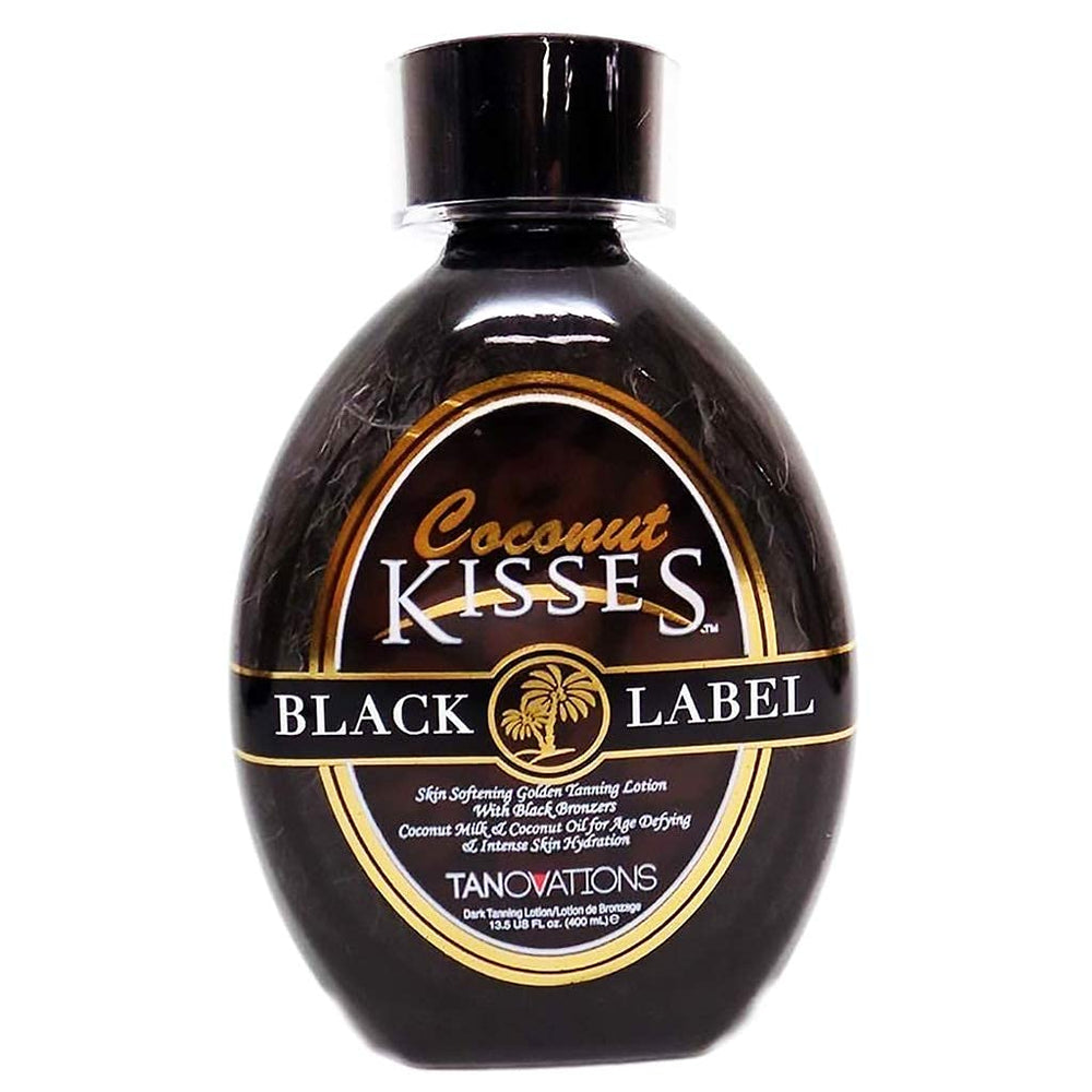 ED HARDY Coconut Kisses Black Label bronzer bottle promoting hydrating bronze results.