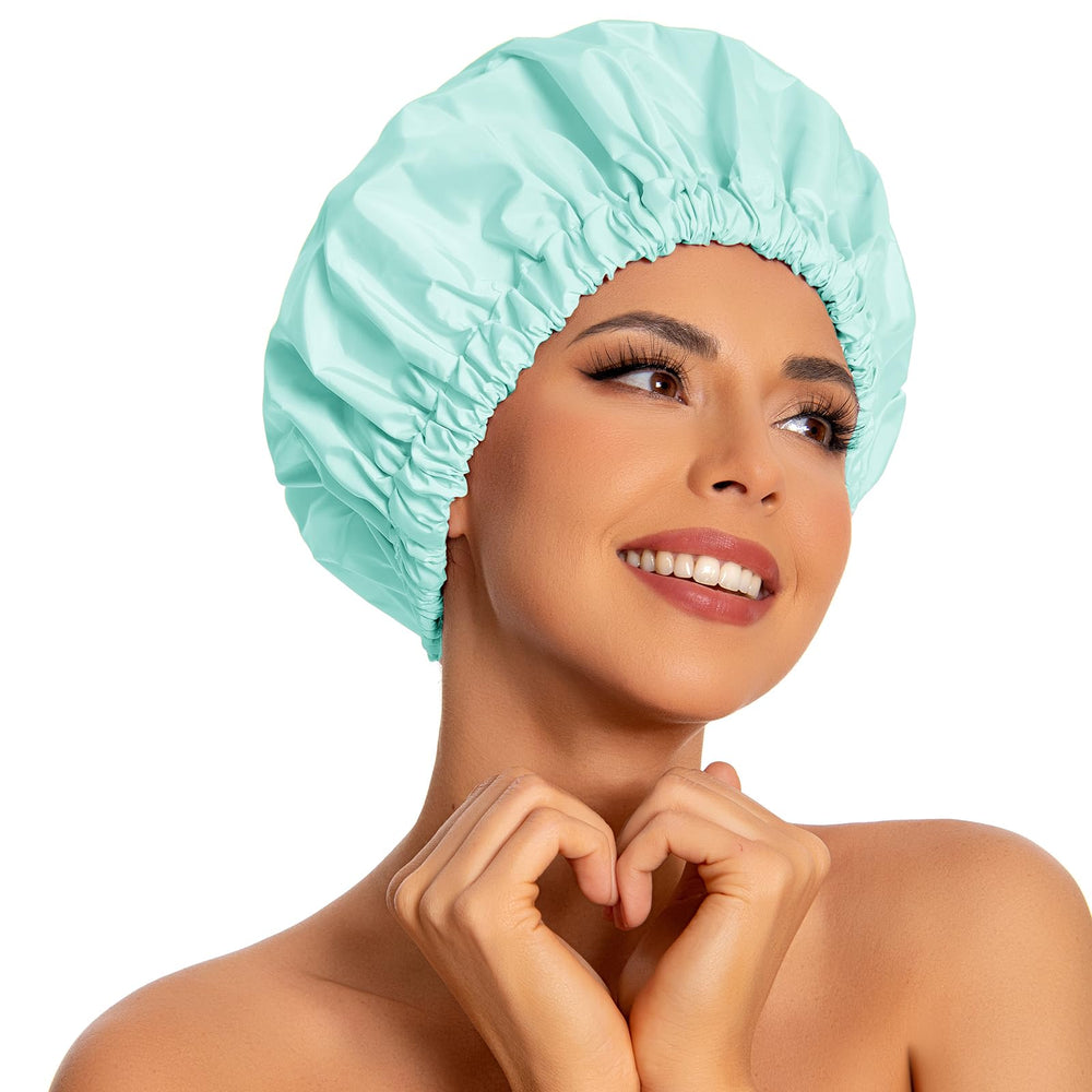 Edoneery mint-green shower cap waterproof outer protects hair during showers.
