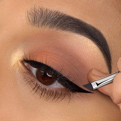 EIGSHOW Eyeliner Brush slanted flat angle aids smooth line control.