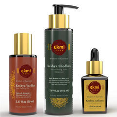 ekmiveda hair growth oil being poured on scalp for nourishment