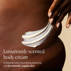 Elemis Frangipani Monoi Body Cream texture close-up highlights rich, creamy consistency.