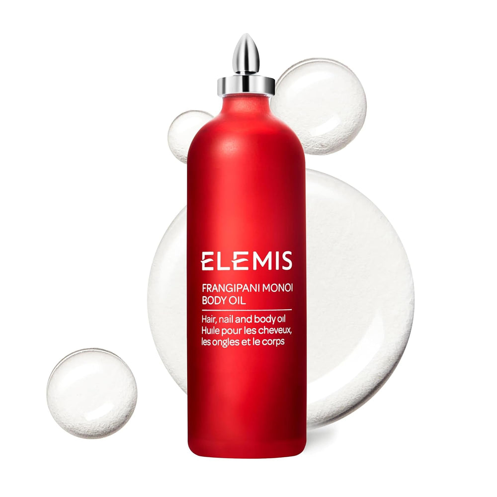 ELEMIS Frangipani Monoi Body Oil bottle on a clean surface for nourishing skin.