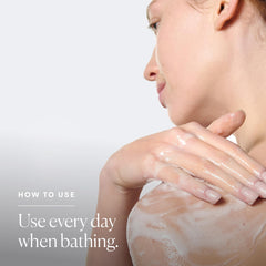 Elemis Frangipani Monoi shower cream foam close-up highlighting creamy texture for daily use.