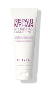 ELEVEN AUSTRALIA Repair My Hair Conditioner bottle closeup highlighting hydrating repair for damaged hair