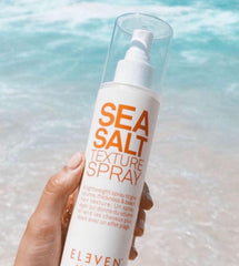 ELEVEN AUSTRALIA Sea Salt Texture Spray hands-on application highlights gritty texture and grip.