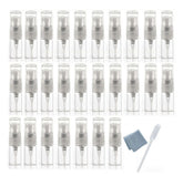 Elfenstall mini clear 2ml bottle closeup highlights travel-friendly fragrance samples.