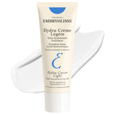 Embryolisse Hydra-Cream Light tube being squeezed for weightless hydration