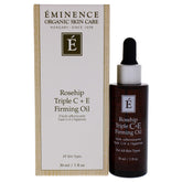 Eminence Rosehip Triple C+E Firming Oil bottle on vanity delivering deep hydration for mature skin.