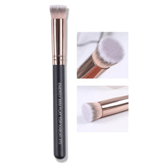 ENERGY Small Foundation Brush under-eye concealer close-up for precise blending.