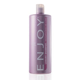 Enjoy Luxury Shampoo bottle pour demonstrates frizz-control for smoother hair