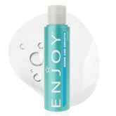 Enjoy Shine & Smooth frizz-control bottle demonstrates silky, weightless hair