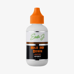 Ericka J Hold Me Down Adhesive Sport peach glue tube showing quick-dry, sweat-resistant hold