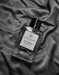 Glass atomizer detail underlines travel-friendly luxury and easy application.