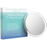 Essential Skin Solutions 15X magnifying mirror close-up for precise tweezing and makeup checks.