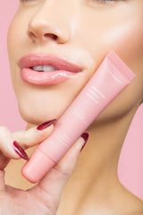 ESW Beauty Strawberry Banana Smoothie Lip Treatment ingredients highlight shea butter and hyaluronic acid for hydration.