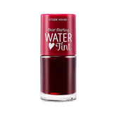 ETUDE Dear Darling Water Tint Cherry Ade swatch on lips showing vibrant color with hydration.