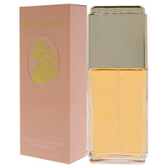 Evyan White Shoulders bottle with worn portrait suggests versatile everyday scent.