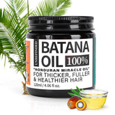 Fadelo Batana Oil bottle pour for scalp nourishment and hair growth potential.