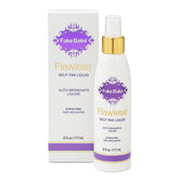 Fake Bake Flawless tanner bottle closeup shows quick-dry, streak-free bronze results.