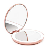 Fancii Lumi rose gold folding mirror closed for compact travel storage.