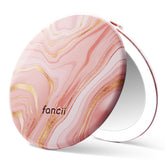 Fancii Taylor marble rose mirror closed for travel portability and grooming on the go