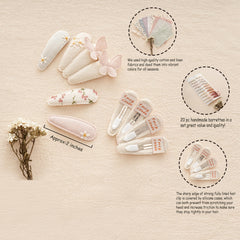 Fancy Clouds neutral fabric snap clips in mustard and khaki complement many outfits.