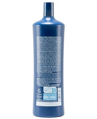 Fanola Wonder No Orange shampoo lather demonstrates blue toning for cooler blonde and brunette shades.
