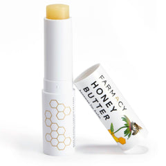 Farmacy Honey Butter jar closeup showing rich beeswax lip balm for deep hydration.