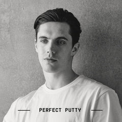 Fatboy Hair Perfect Putty rubbed between palms demonstrating easy application