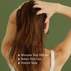 FEIBTH Natural Hair Growth Oil drops demonstrate easy scalp application for daily care.