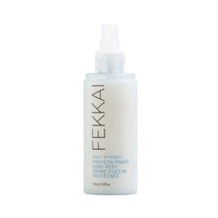 Fekkai PowerBond Mist bottle shows vegan formula for stronger, smoother hair.