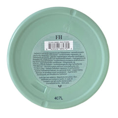 Fenty Hair Richer One label close-up highlights luxe amber floral fragrance